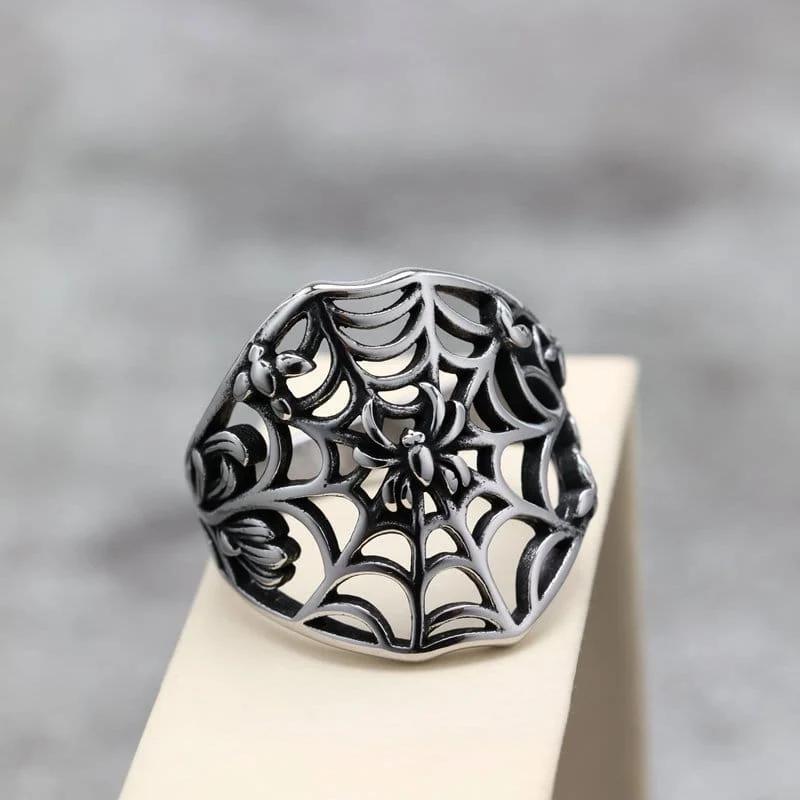 Herrring med ihålig spindel och spindelnät i punkstil