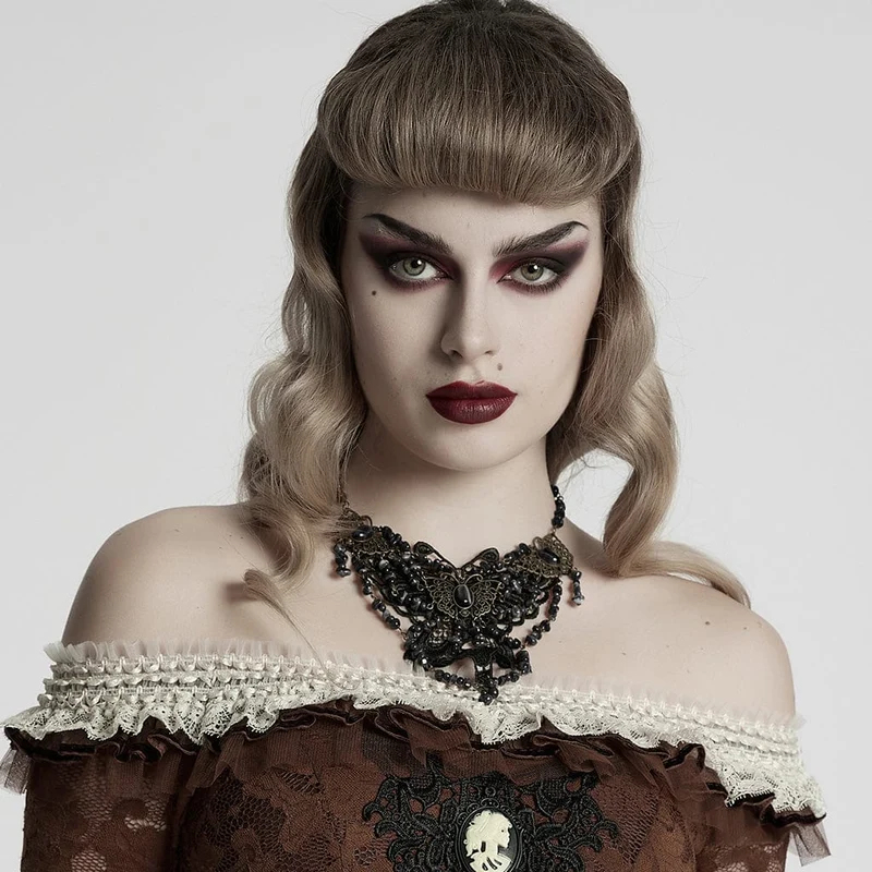 Dam Steampunk Oregelbunden pärlstav Fjärilshalsband Svart