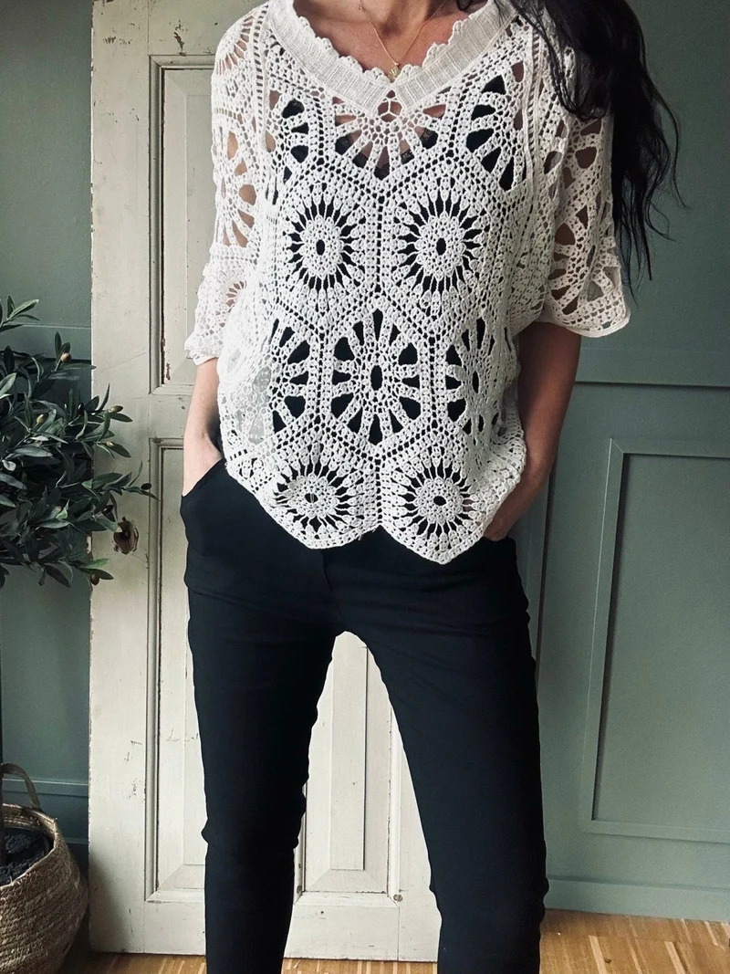 Blus bohemisk stickning